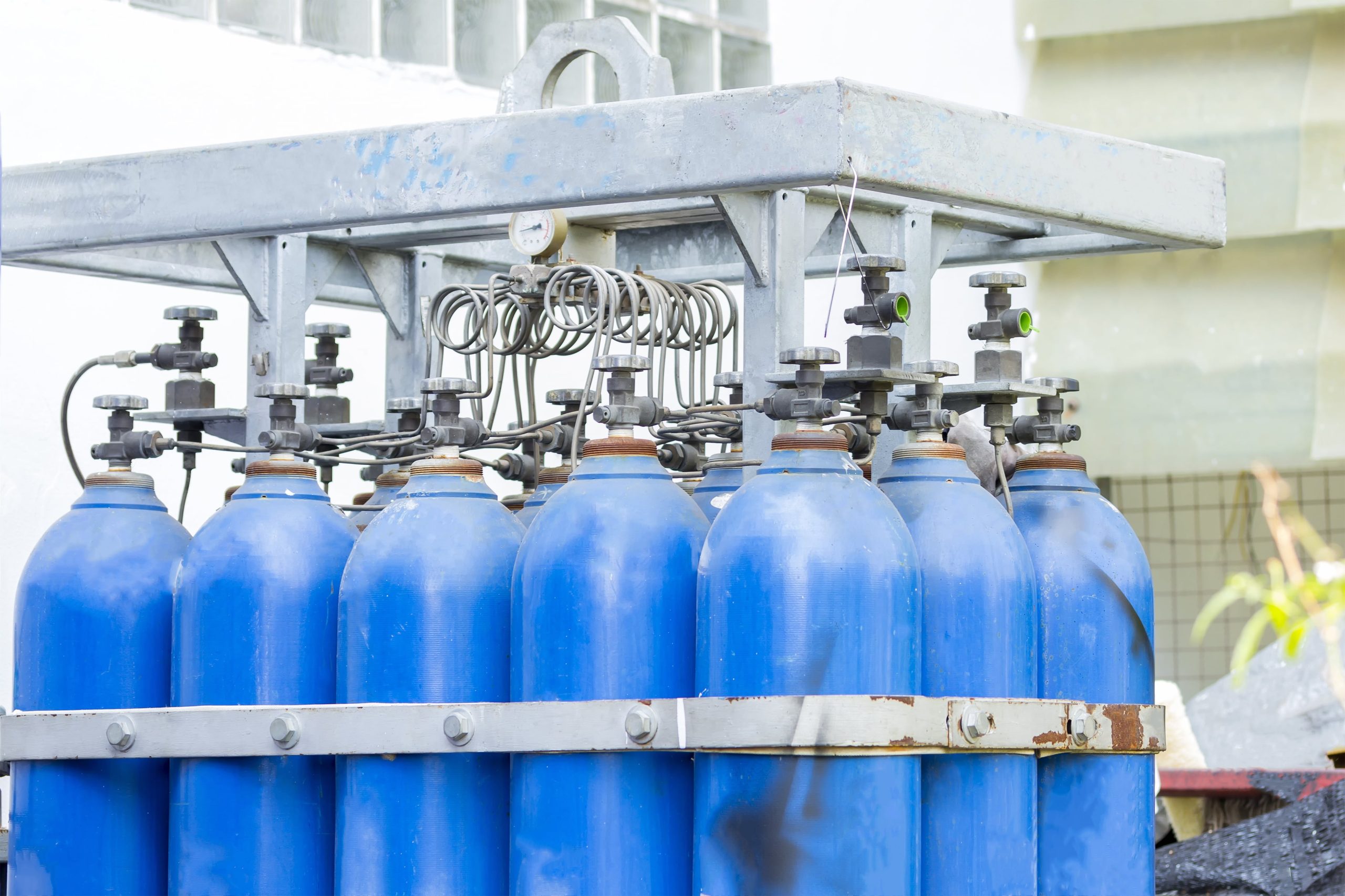 a bunch of blue cylinders are stacked on top of each other