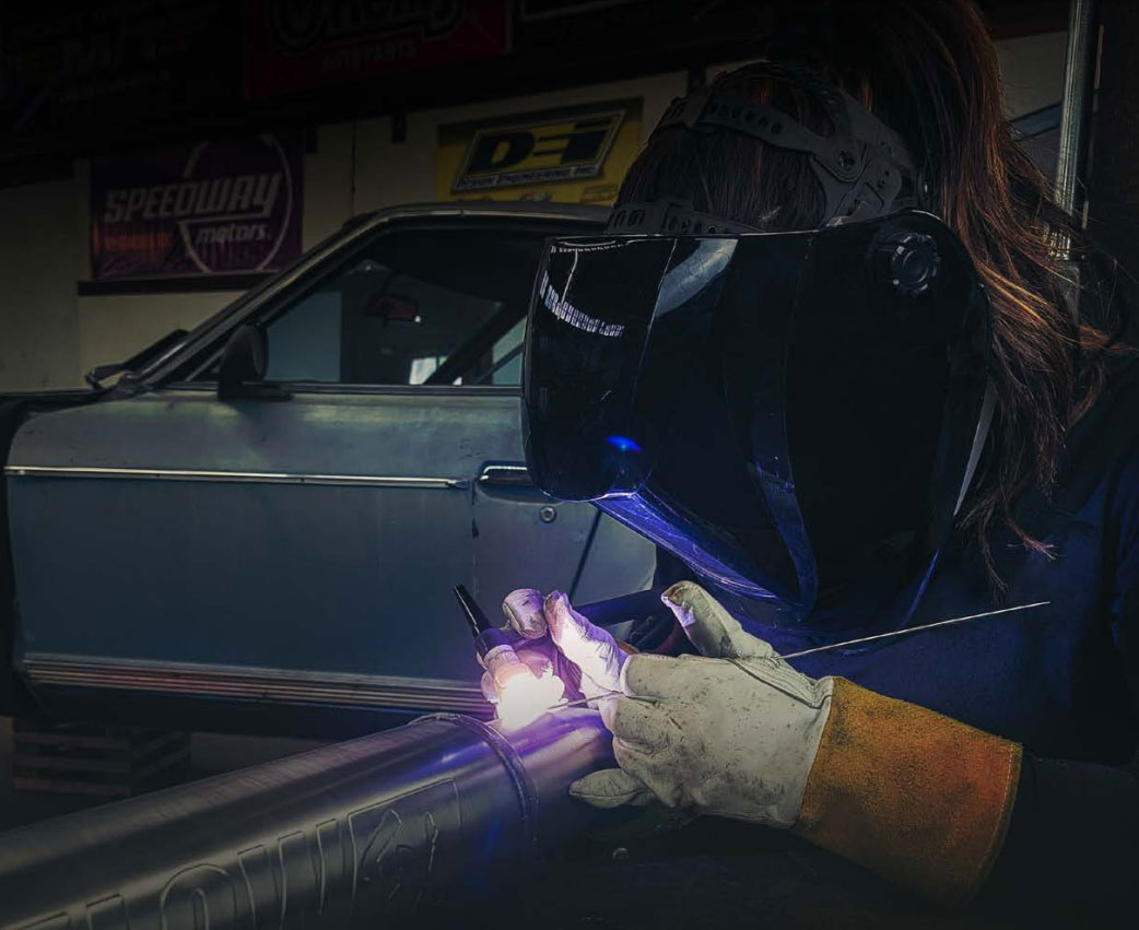 a woman welding